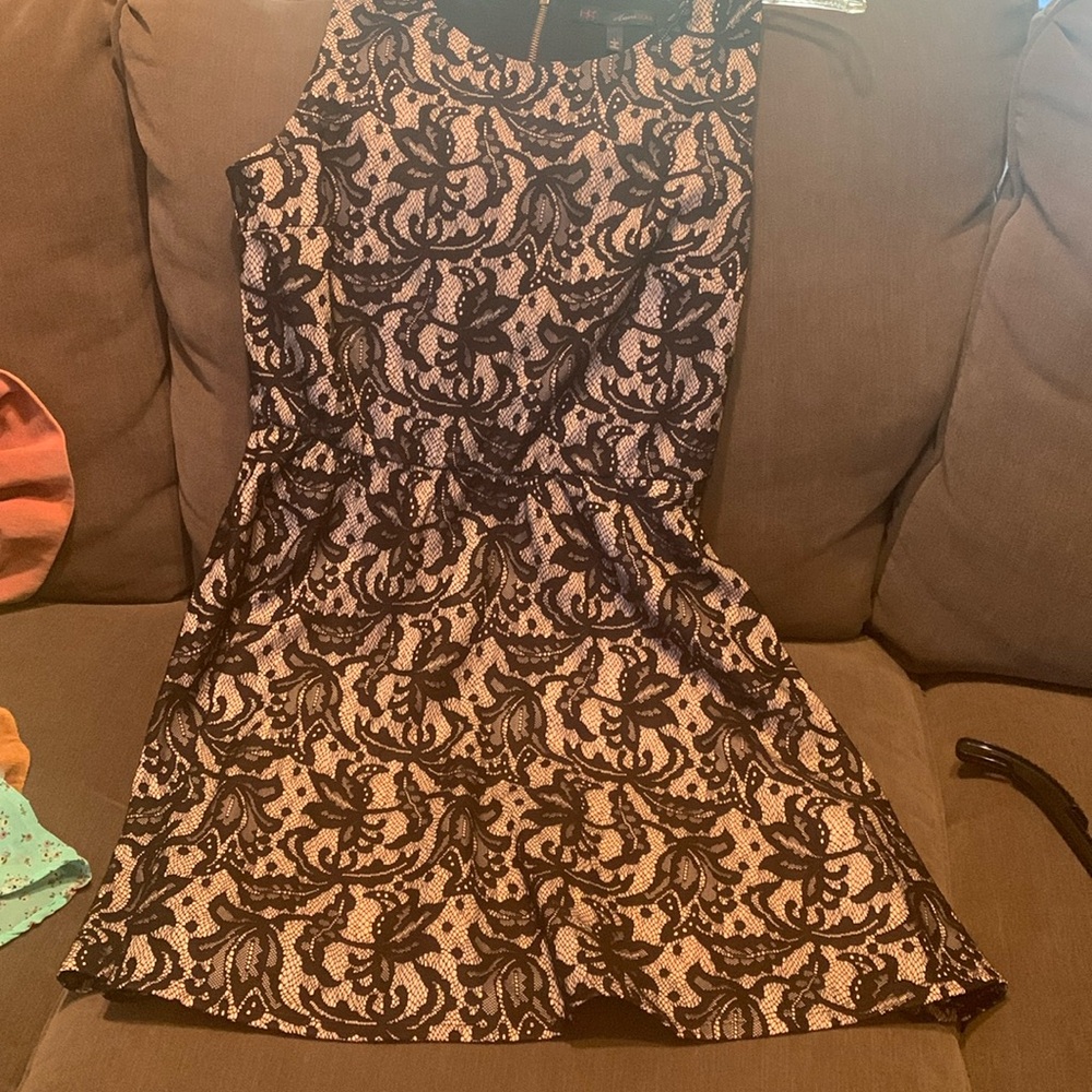 Sleeveless black parsley dress.  Mini length